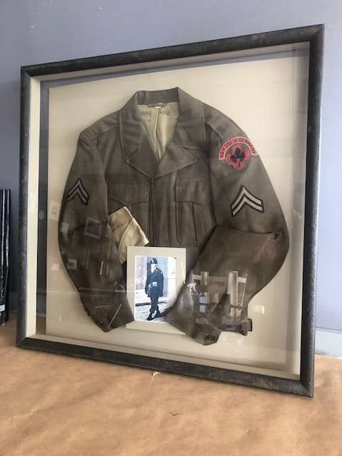 Framed military jacket shadow box with photo and medals