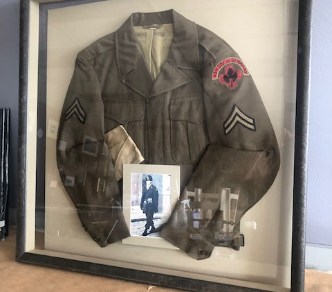 Framed military memorabilia display
